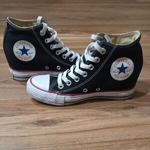 Converse Black High-Top Wedge Sneakers with White Laces and Red Trim